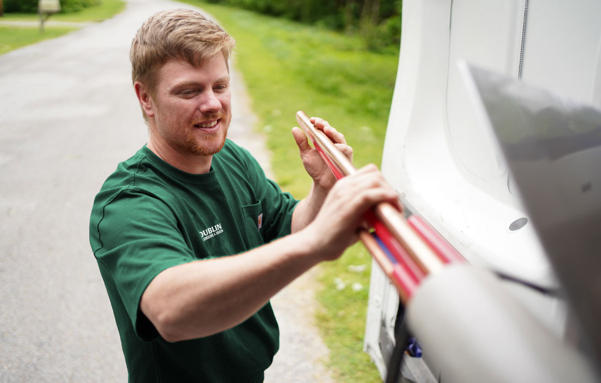 Plumber with plumbing equipment